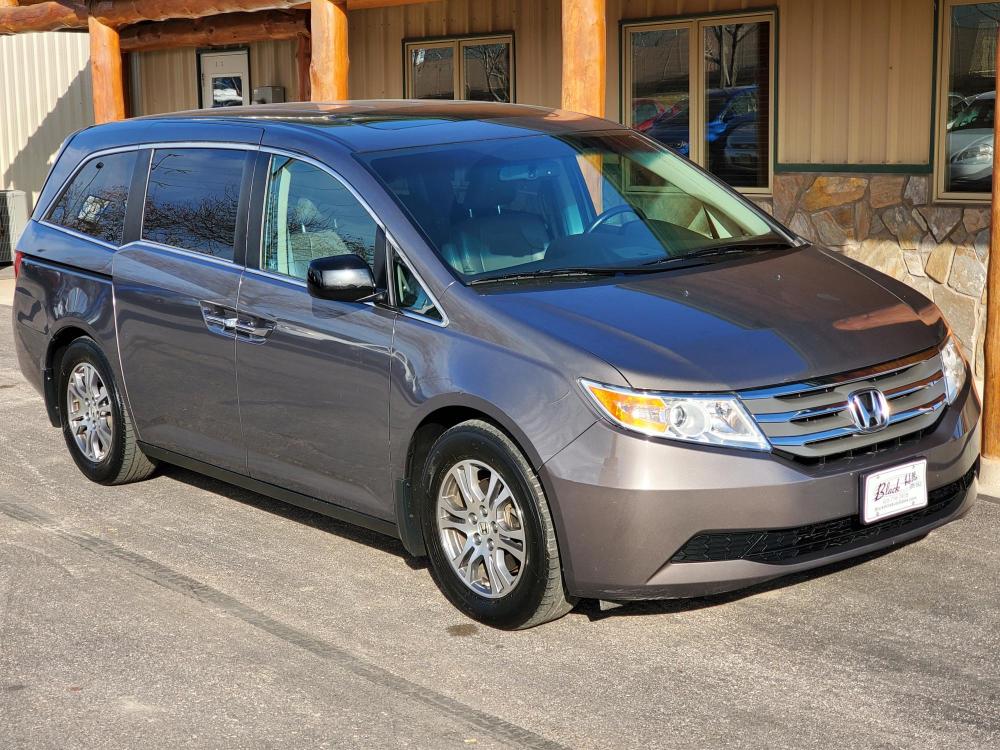 2012 Gray Honda Odyssey EX-L (5FNRL5H61CB) with an 3.5L V-6 engine, 5-Speed Automatic transmission, located at 1600 E Hwy 44, Rapid City, SD, 57703, (605) 716-7878, 44.070232, -103.171410 - Photo #0
