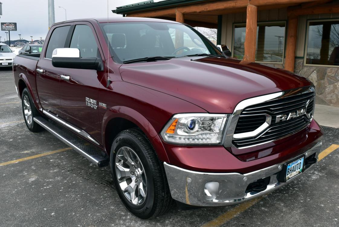 2017 Maroon /Black Ram 1500 Limited with an 5.7L Hemi V8 MDS VVT engine, 8-Speed Automatic transmission, located at 1600 E Hwy 44, Rapid City, SD, 57703, (605) 716-7878, 44.070232, -103.171410 - Photo #0