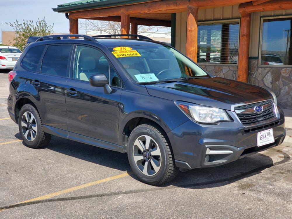 2018 Gray Subaru Forester i-Premium (JF2SJAGC2JH) with an 2.5L 4 Cyl engine, 6-Speed CVT transmission, located at 1600 E Hwy 44, Rapid City, SD, 57703, (605) 716-7878, 44.070232, -103.171410 - Photo #0