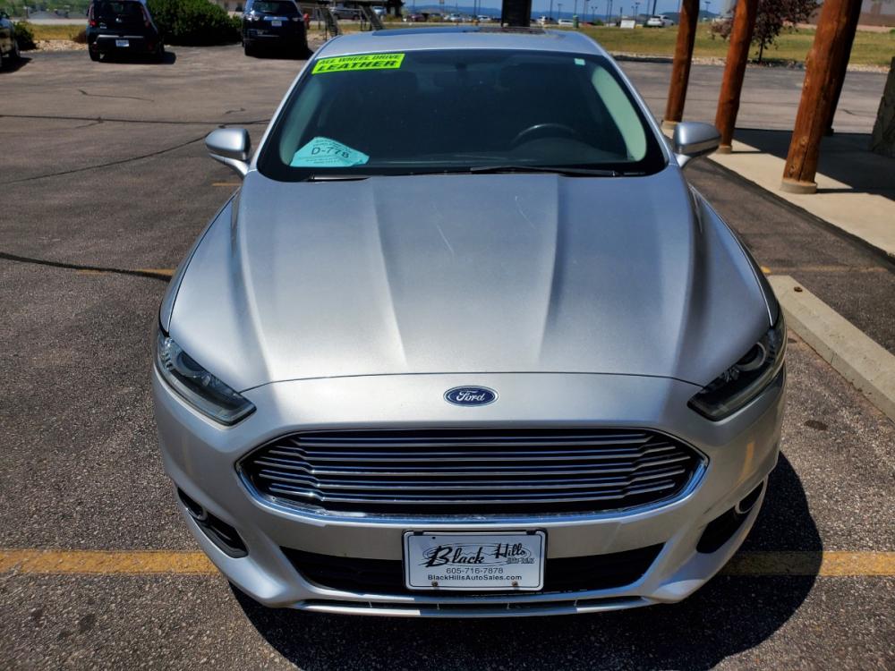 2016 Silver Ford Fusion SE (3FA6P0T9XGR) with an 2.0L 4 Cyl Ecoboost engine, 6-Speed Automatic W/ Selectshift transmission, located at 1600 E Hwy 44, Rapid City, SD, 57703, (605) 716-7878, 44.070232, -103.171410 - Photo #1