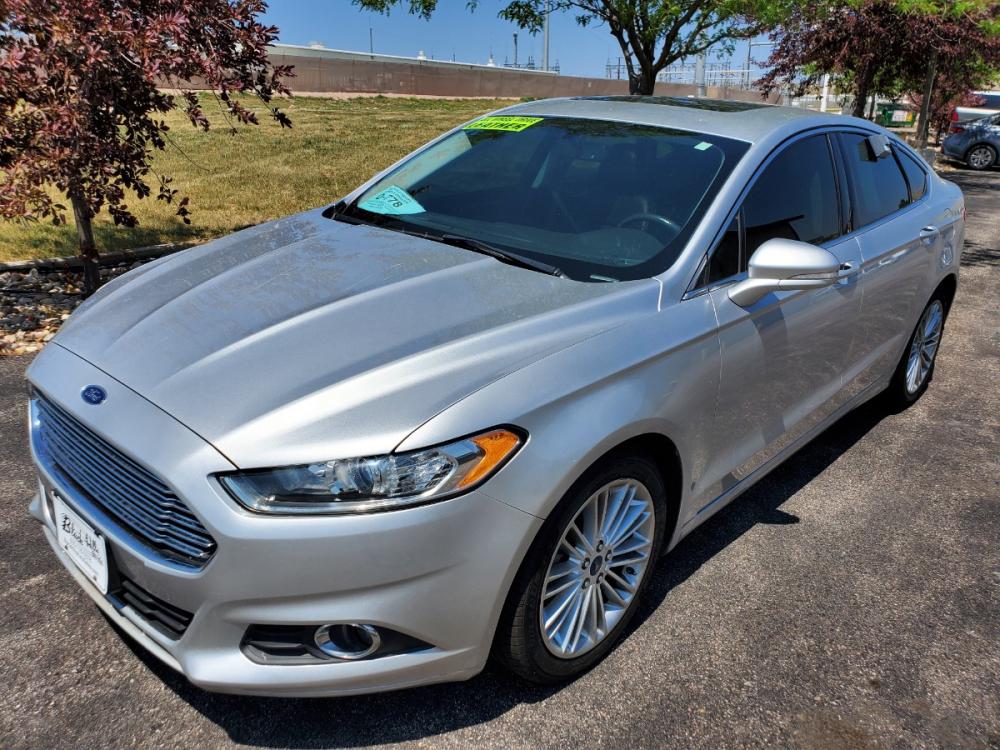 2016 Silver Ford Fusion SE (3FA6P0T9XGR) with an 2.0L 4 Cyl Ecoboost engine, 6-Speed Automatic W/ Selectshift transmission, located at 1600 E Hwy 44, Rapid City, SD, 57703, (605) 716-7878, 44.070232, -103.171410 - Photo #2