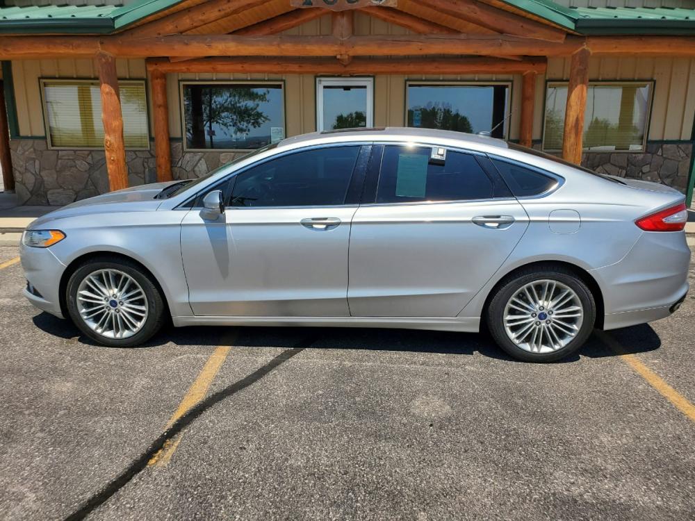2016 Silver Ford Fusion SE (3FA6P0T9XGR) with an 2.0L 4 Cyl Ecoboost engine, 6-Speed Automatic W/ Selectshift transmission, located at 1600 E Hwy 44, Rapid City, SD, 57703, (605) 716-7878, 44.070232, -103.171410 - Photo #3
