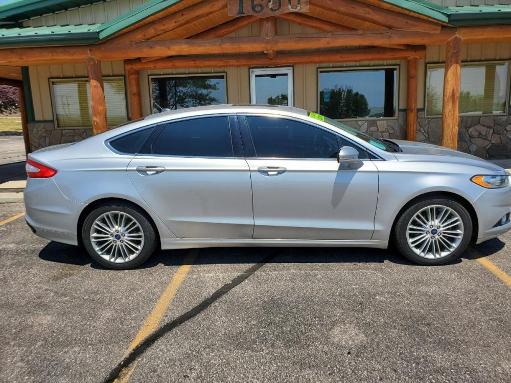 2016 Silver Ford Fusion SE (3FA6P0T9XGR) with an 2.0L 4 Cyl Ecoboost engine, 6-Speed Automatic W/ Selectshift transmission, located at 1600 E Hwy 44, Rapid City, SD, 57703, (605) 716-7878, 44.070232, -103.171410 - Photo #4