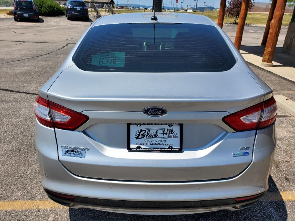 2016 Silver Ford Fusion SE (3FA6P0T9XGR) with an 2.0L 4 Cyl Ecoboost engine, 6-Speed Automatic W/ Selectshift transmission, located at 1600 E Hwy 44, Rapid City, SD, 57703, (605) 716-7878, 44.070232, -103.171410 - Photo #6
