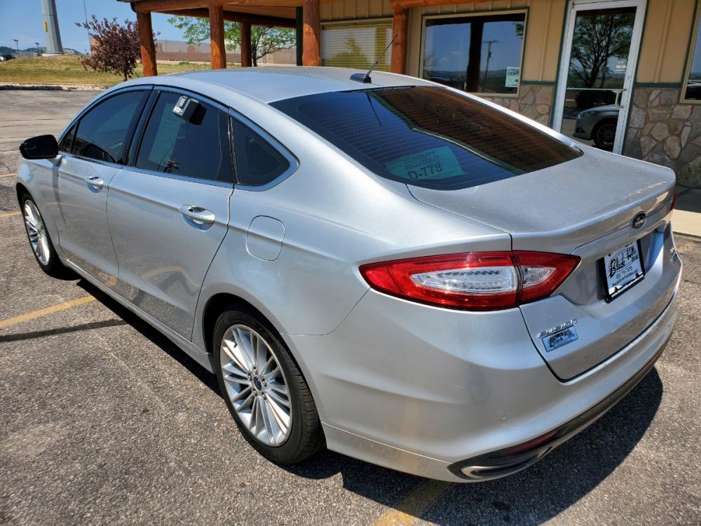 2016 Silver Ford Fusion SE (3FA6P0T9XGR) with an 2.0L 4 Cyl Ecoboost engine, 6-Speed Automatic W/ Selectshift transmission, located at 1600 E Hwy 44, Rapid City, SD, 57703, (605) 716-7878, 44.070232, -103.171410 - Photo #7
