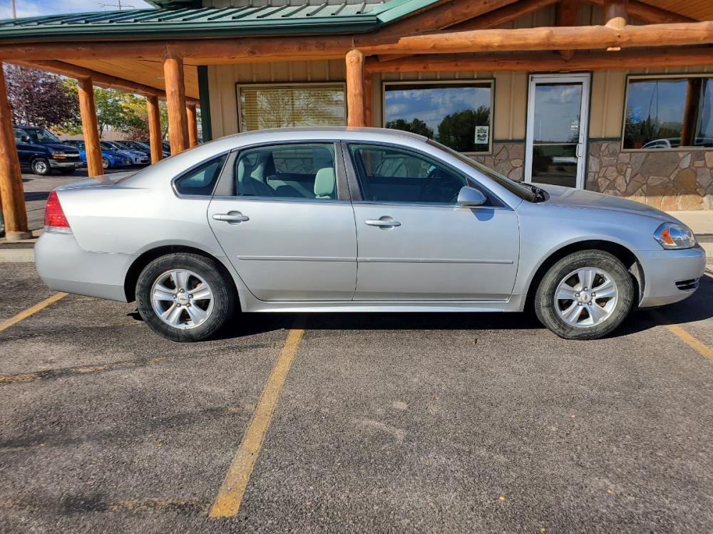 2015 Silver Chevrolet Impala LS (2G1WA5E30F1) with an 3.6L V6 engine, 6-Speed Automatic transmission, located at 1600 E Hwy 44, Rapid City, SD, 57703, (605) 716-7878, 44.070232, -103.171410 - Photo #4
