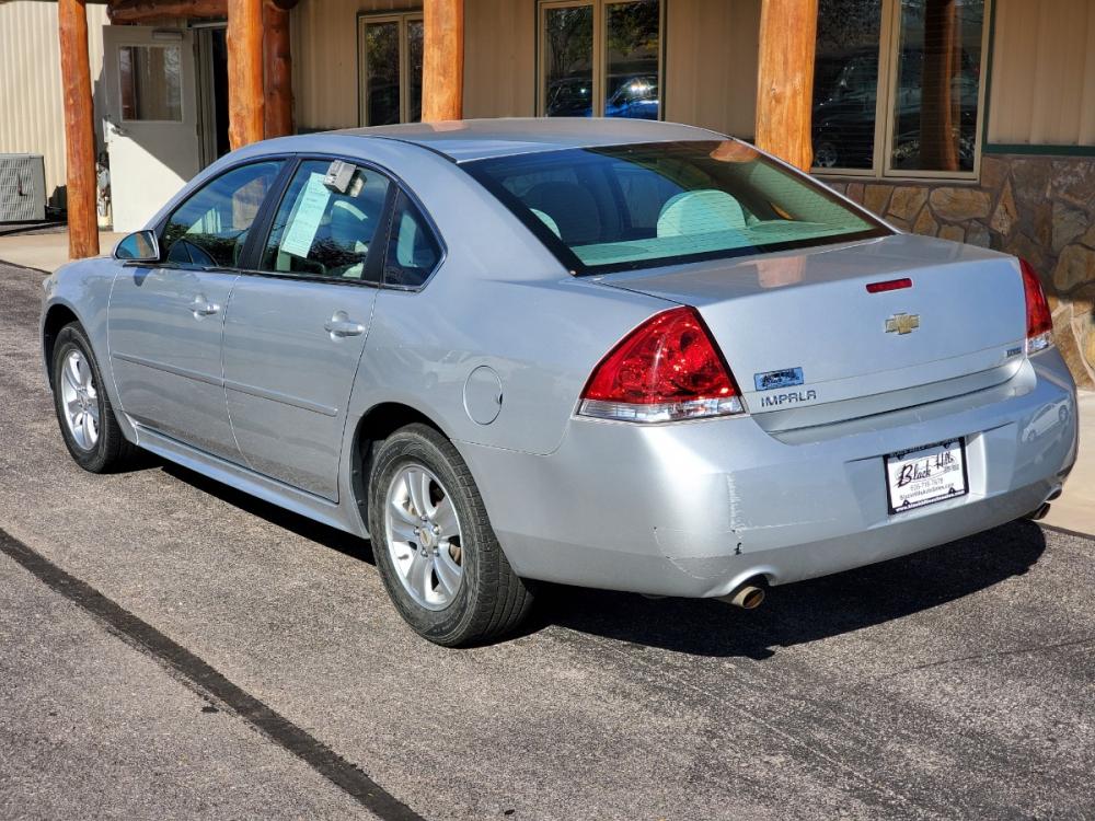2015 Silver Chevrolet Impala LS (2G1WA5E30F1) with an 3.6L V6 engine, 6-Speed Automatic transmission, located at 1600 E Hwy 44, Rapid City, SD, 57703, (605) 716-7878, 44.070232, -103.171410 - Photo #5