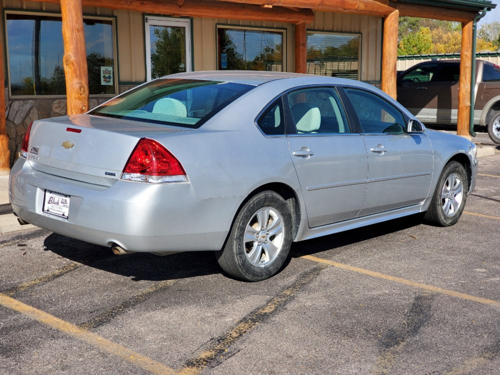 2015 Silver Chevrolet Impala LS (2G1WA5E30F1) with an 3.6L V6 engine, 6-Speed Automatic transmission, located at 1600 E Hwy 44, Rapid City, SD, 57703, (605) 716-7878, 44.070232, -103.171410 - Photo #7