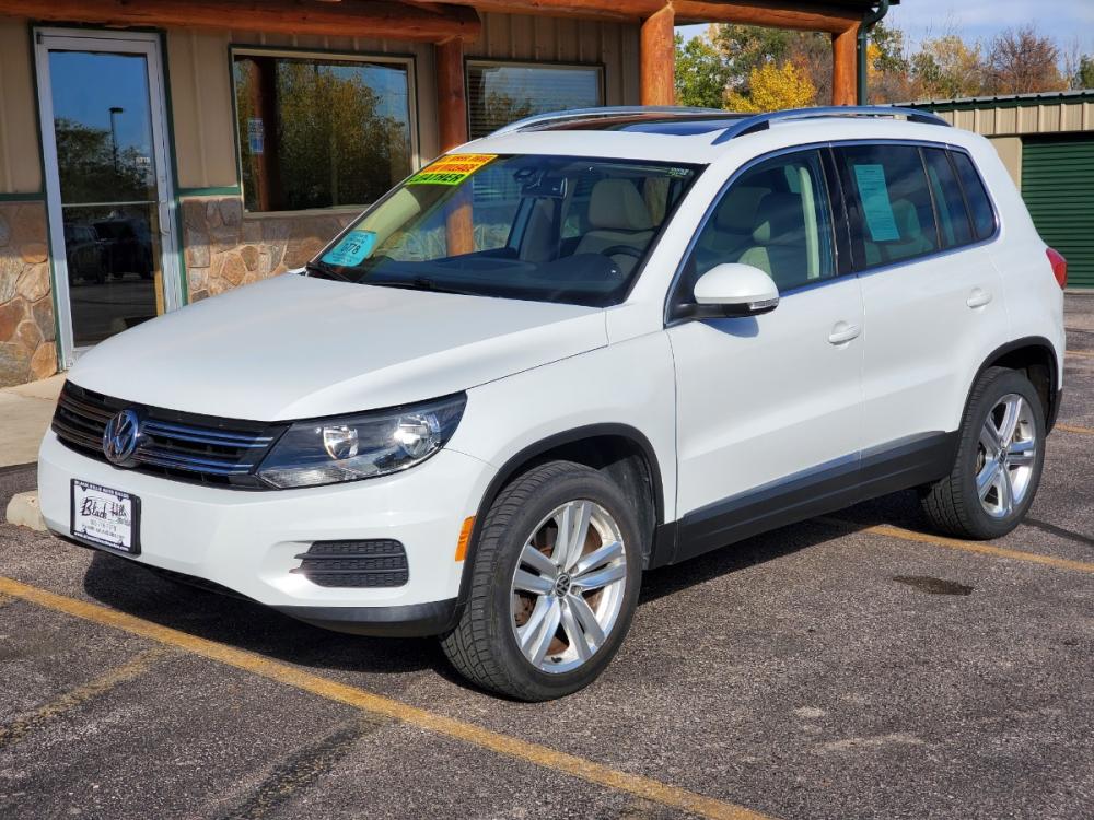 2017 White Volkswagen Tiguan Wolfsburg (WVGSV7AX8HK) with an 2.0L 4-Cyl Intercooled Turbo Charged engine, 6-Speed Automatic transmission, located at 1600 E Hwy 44, Rapid City, SD, 57703, (605) 716-7878, 44.070232, -103.171410 - Photo #2