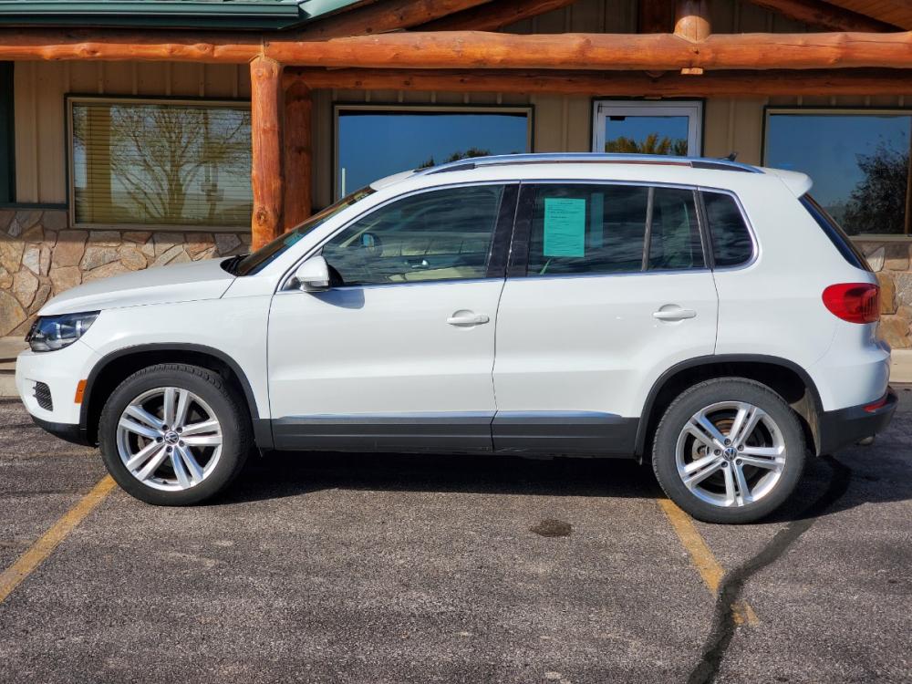 2017 White Volkswagen Tiguan Wolfsburg (WVGSV7AX8HK) with an 2.0L 4-Cyl Intercooled Turbo Charged engine, 6-Speed Automatic transmission, located at 1600 E Hwy 44, Rapid City, SD, 57703, (605) 716-7878, 44.070232, -103.171410 - Photo #3