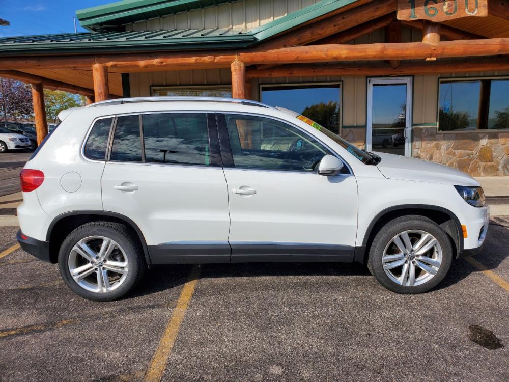 2017 White Volkswagen Tiguan Wolfsburg (WVGSV7AX8HK) with an 2.0L 4-Cyl Intercooled Turbo Charged engine, 6-Speed Automatic transmission, located at 1600 E Hwy 44, Rapid City, SD, 57703, (605) 716-7878, 44.070232, -103.171410 - Photo #4