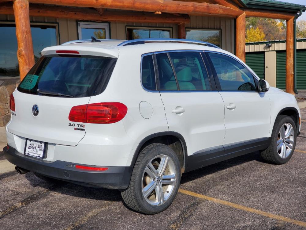 2017 White Volkswagen Tiguan Wolfsburg (WVGSV7AX8HK) with an 2.0L 4-Cyl Intercooled Turbo Charged engine, 6-Speed Automatic transmission, located at 1600 E Hwy 44, Rapid City, SD, 57703, (605) 716-7878, 44.070232, -103.171410 - Photo #7