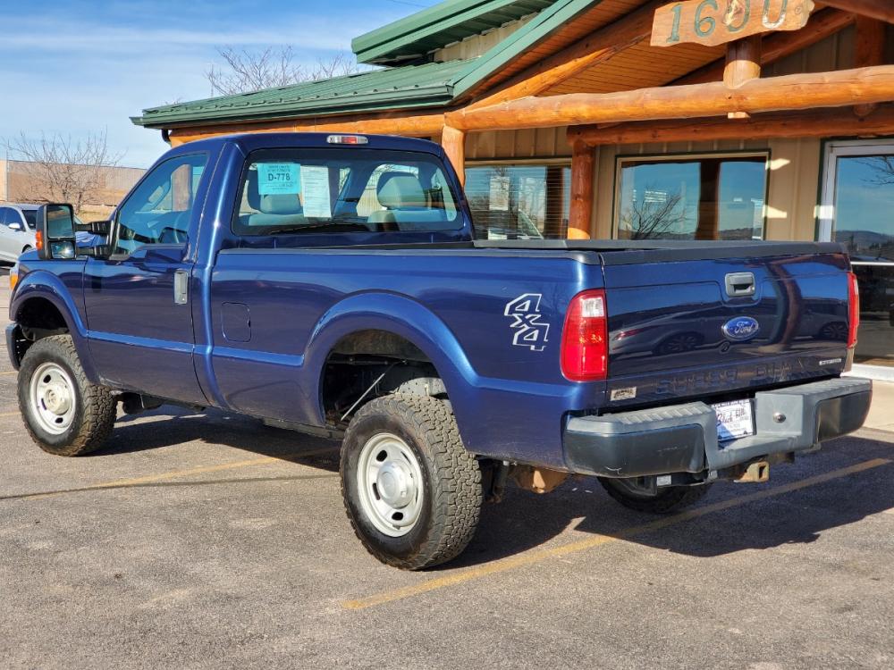 2014 Blue Ford F250 XL (1FTBF2B6XEE) with an 6.2L V8 SOHC EFI engine, 6-Speed Torqshift Automatic w/ OD transmission, located at 1600 E Hwy 44, Rapid City, SD, 57703, (605) 716-7878, 44.070232, -103.171410 - Photo #5