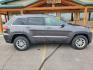 2018 Gray /Black Jeep Grand Cherokee Laredo (1C4RJFAG7JC) with an 3.6L V-6 VVT engine, 8-Speed Automatic transmission, located at 1600 E Hwy 44, Rapid City, SD, 57703, (605) 716-7878, 44.070232, -103.171410 - Photo #4
