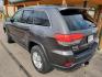 2018 Gray /Black Jeep Grand Cherokee Laredo (1C4RJFAG7JC) with an 3.6L V-6 VVT engine, 8-Speed Automatic transmission, located at 1600 E Hwy 44, Rapid City, SD, 57703, (605) 716-7878, 44.070232, -103.171410 - Photo #5