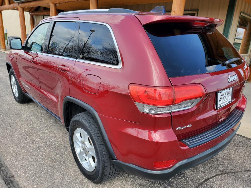 2015 Red /Black Jeep Grand Cherokee Laredo (1C4RJFAG7FC) with an 3.6L V6 24Valve Variable Valve Timing engine, 8_Speed Automatic transmission, located at 1600 E Hwy 44, Rapid City, SD, 57703, (605) 716-7878, 44.070232, -103.171410 - Photo #7