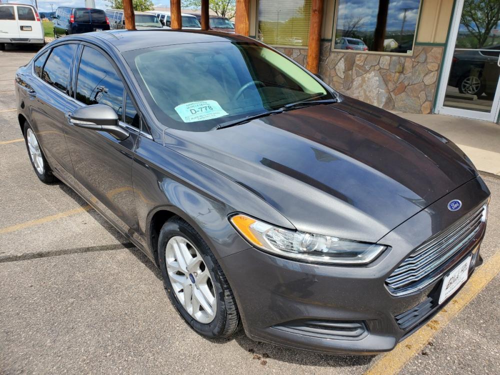 2016 Gray Ford Fusion SE (3FA6P0H73GR) with an 2.5L 4 Cyl engine, 6-Speed Automatic W/ Selectshift transmission, located at 1600 E Hwy 44, Rapid City, SD, 57703, (605) 716-7878, 44.070232, -103.171410 - Photo #0