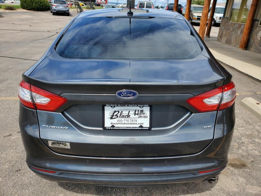 2016 Gray Ford Fusion SE (3FA6P0H73GR) with an 2.5L 4 Cyl engine, 6-Speed Automatic W/ Selectshift transmission, located at 1600 E Hwy 44, Rapid City, SD, 57703, (605) 716-7878, 44.070232, -103.171410 - Photo #6