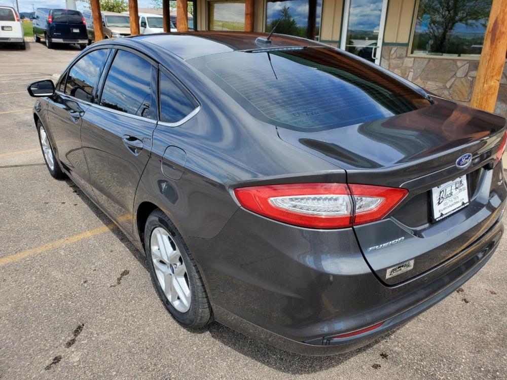 2016 Gray Ford Fusion SE (3FA6P0H73GR) with an 2.5L 4 Cyl engine, 6-Speed Automatic W/ Selectshift transmission, located at 1600 E Hwy 44, Rapid City, SD, 57703, (605) 716-7878, 44.070232, -103.171410 - Photo #7