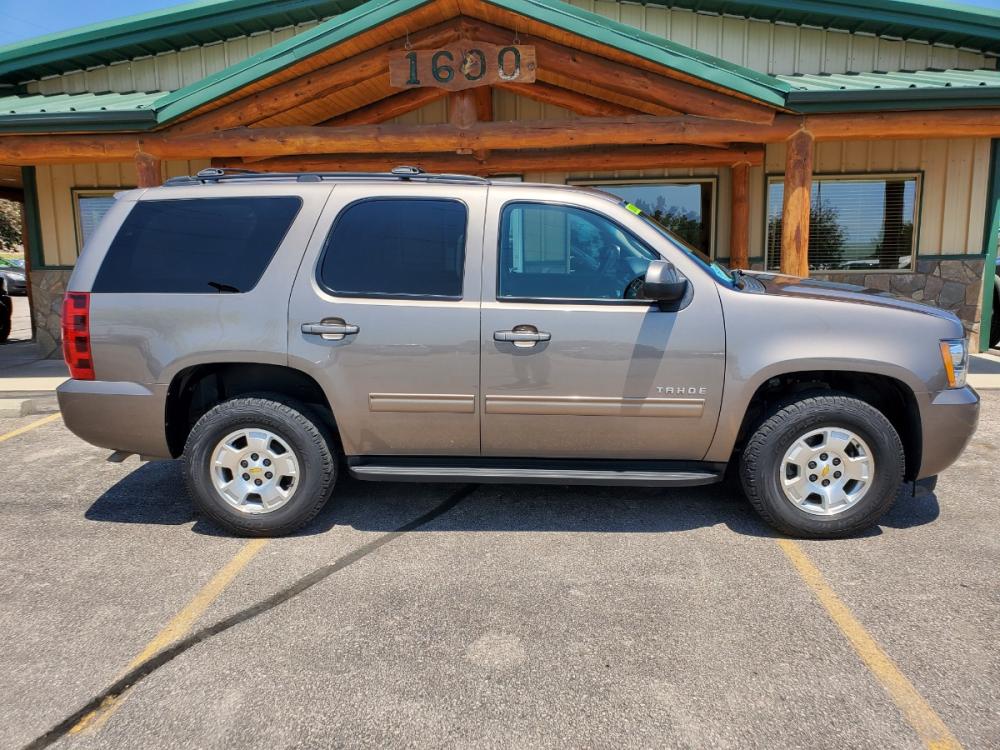 2012 Gray /Black Chevrolet Tahoe LS (1GNSKAE08CR) with an 5.3L V-8 Vortec SFI engine, 6-Speed Automatic, Electronically Controlled transmission, located at 1600 E Hwy 44, Rapid City, SD, 57703, (605) 716-7878, 44.070232, -103.171410 - Photo #4