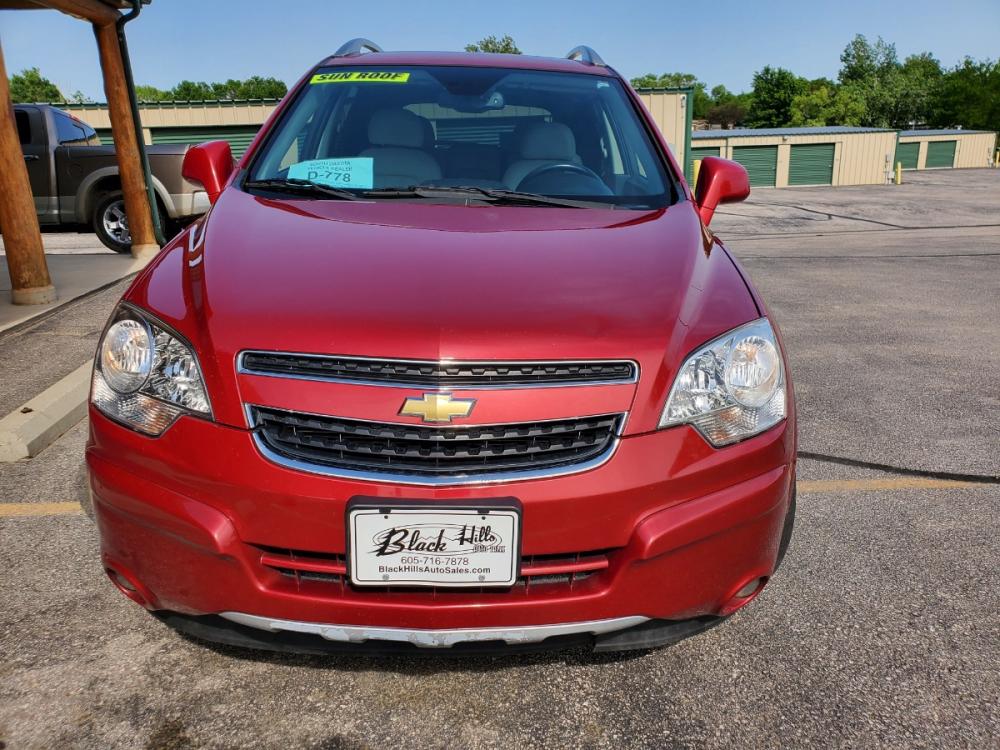 2014 Red /Black & Beige Chevrolet Captiva Sport LTZ (3GNAL4EK0ES) with an 2.4L 4Cyl engine, 6-Speed Automatic transmission, located at 1600 E Hwy 44, Rapid City, SD, 57703, (605) 716-7878, 44.070232, -103.171410 - Photo #1