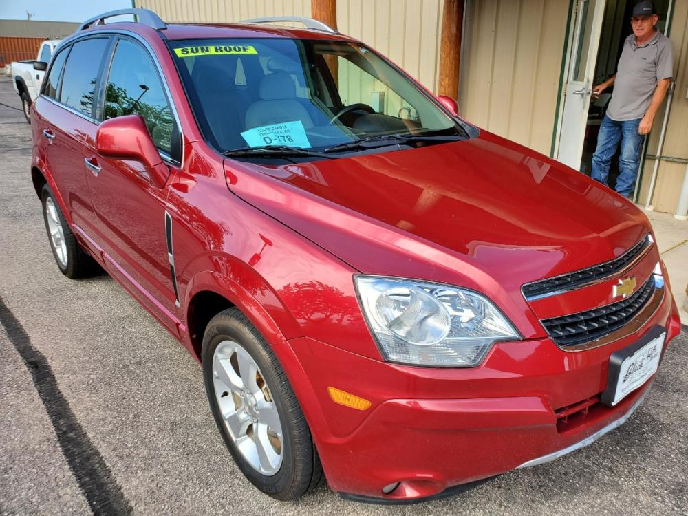 2014 Red /Black & Beige Chevrolet Captiva Sport LTZ (3GNAL4EK0ES) with an 2.4L 4Cyl engine, 6-Speed Automatic transmission, located at 1600 E Hwy 44, Rapid City, SD, 57703, (605) 716-7878, 44.070232, -103.171410 - Photo #0