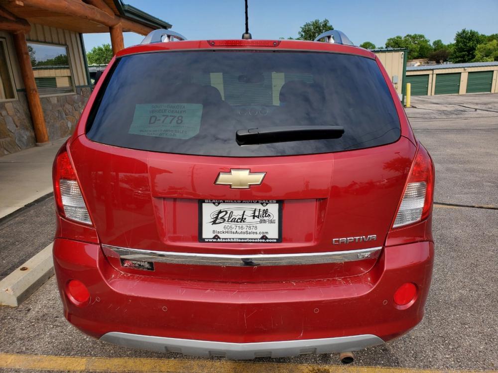 2014 Red /Black & Beige Chevrolet Captiva Sport LTZ (3GNAL4EK0ES) with an 2.4L 4Cyl engine, 6-Speed Automatic transmission, located at 1600 E Hwy 44, Rapid City, SD, 57703, (605) 716-7878, 44.070232, -103.171410 - Photo #6