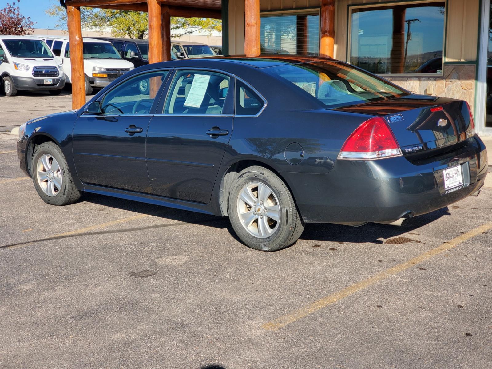 2014 Gray /Gray Chevrolet Impala Limited LS (2G1WA5E37E1) with an 3.6L V-6 engine, 6-Speed Automatic transmission, located at 1600 E Hwy 44, Rapid City, SD, 57703, (605) 716-7878, 44.070232, -103.171410 - Photo #5