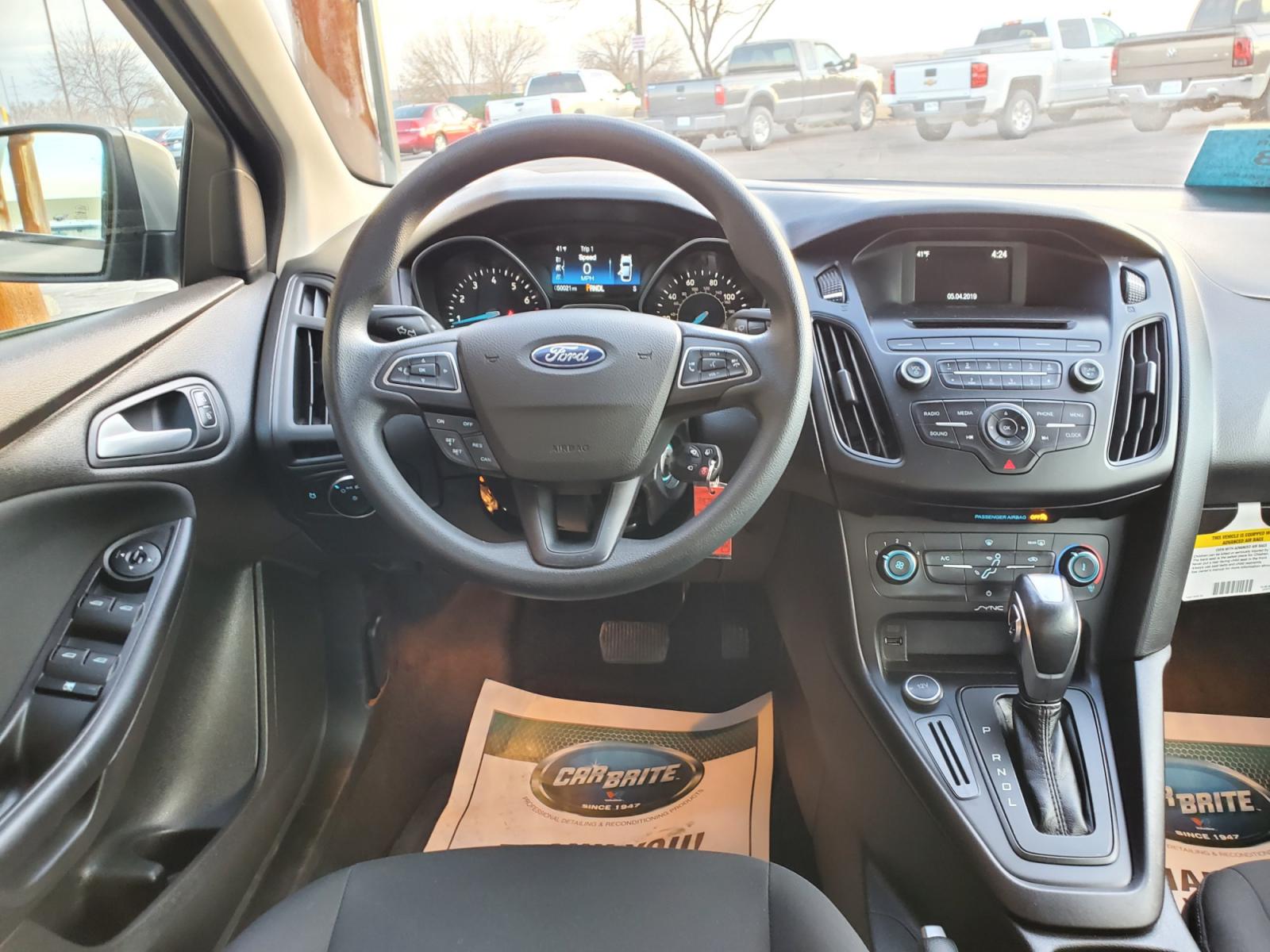 2016 Tan /Black Ford Focus SE (1FADP3F23GL) with an 2.0L 4Cyl GDI TI-VCT engine, 6-Speed Powershift Automatic transmission, located at 1600 E Hwy 44, Rapid City, SD, 57703, (605) 716-7878, 44.070232, -103.171410 - Photo #12