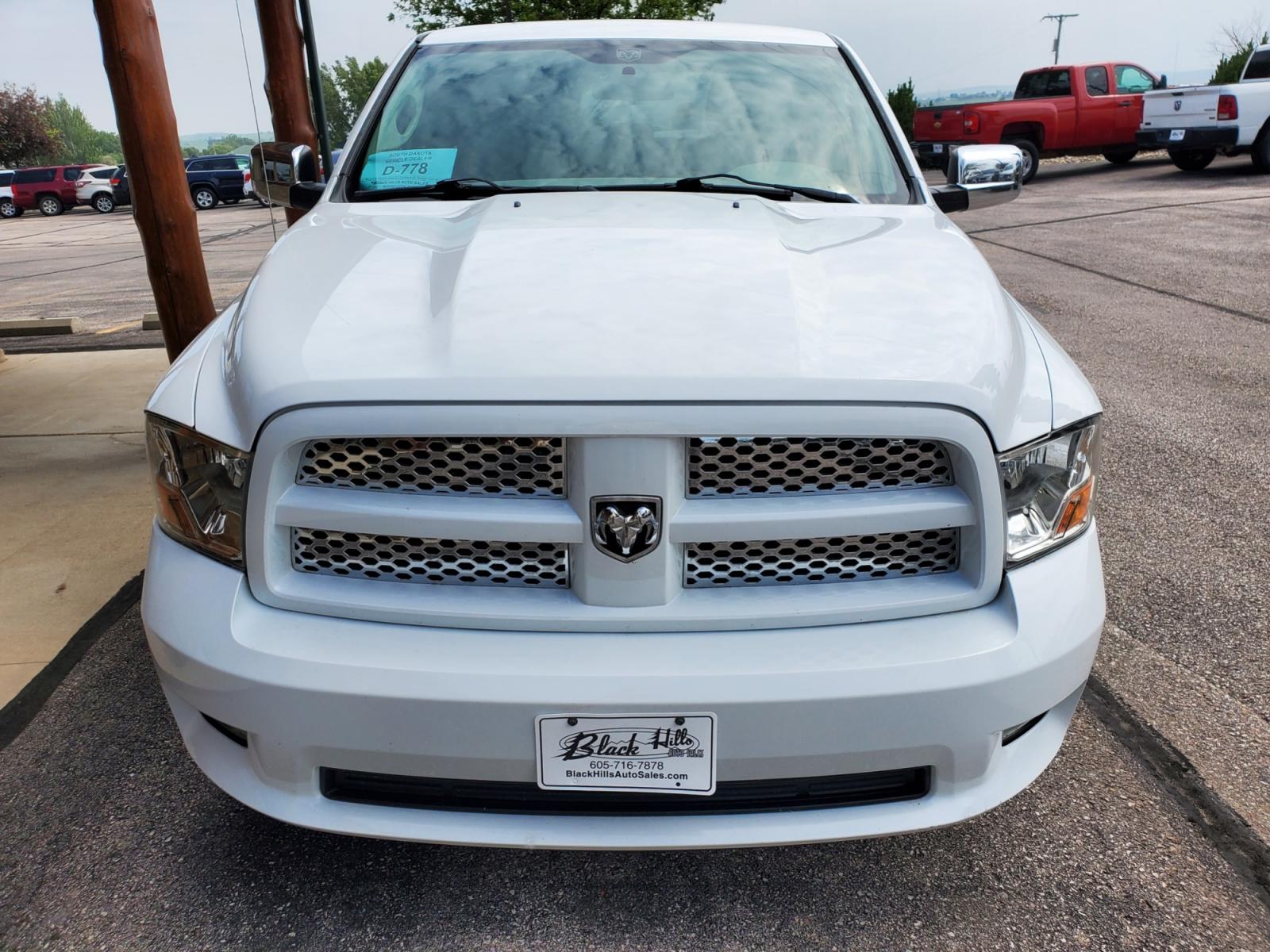 2012 White Ram 1500 Express (1C6RD6FT3CS) with an 5.7L V8 HEMI Multi-Displacement VVT engine, 6-Speed Automatic transmission, located at 1600 E Hwy 44, Rapid City, SD, 57703, (605) 716-7878, 44.070232, -103.171410 - Photo #1