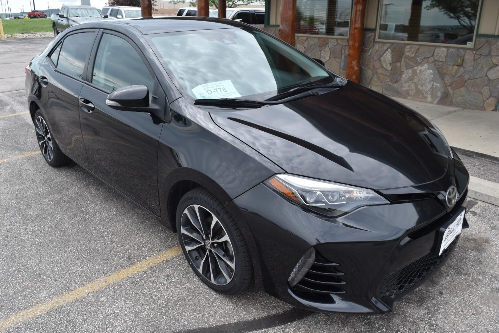 2017 Black Toyota Corolla SE (2T1BURHE5HC) with an 1.8L 4 Cyl engine, AV-S7 Automatic transmission, located at 1600 E Hwy 44, Rapid City, SD, 57703, (605) 716-7878, 44.070232, -103.171410 - Photo#0