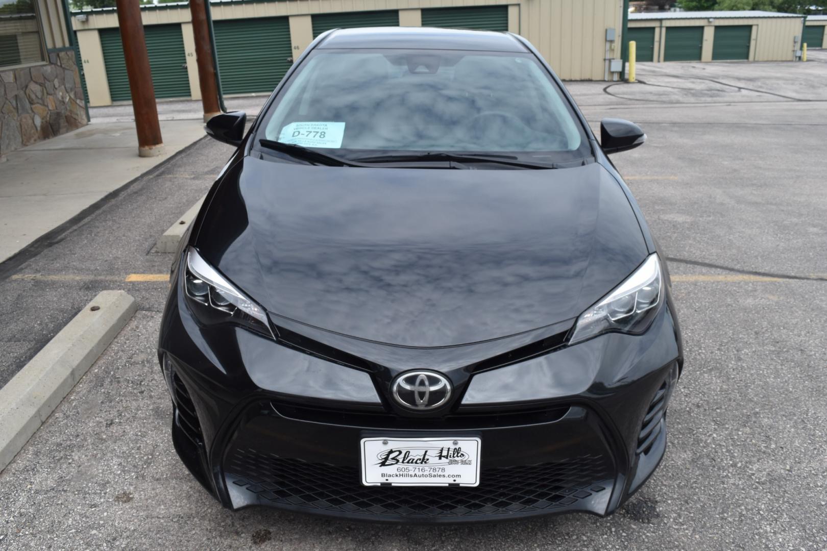 2017 Black Toyota Corolla SE (2T1BURHE5HC) with an 1.8L 4 Cyl engine, AV-S7 Automatic transmission, located at 1600 E Hwy 44, Rapid City, SD, 57703, (605) 716-7878, 44.070232, -103.171410 - Photo#1