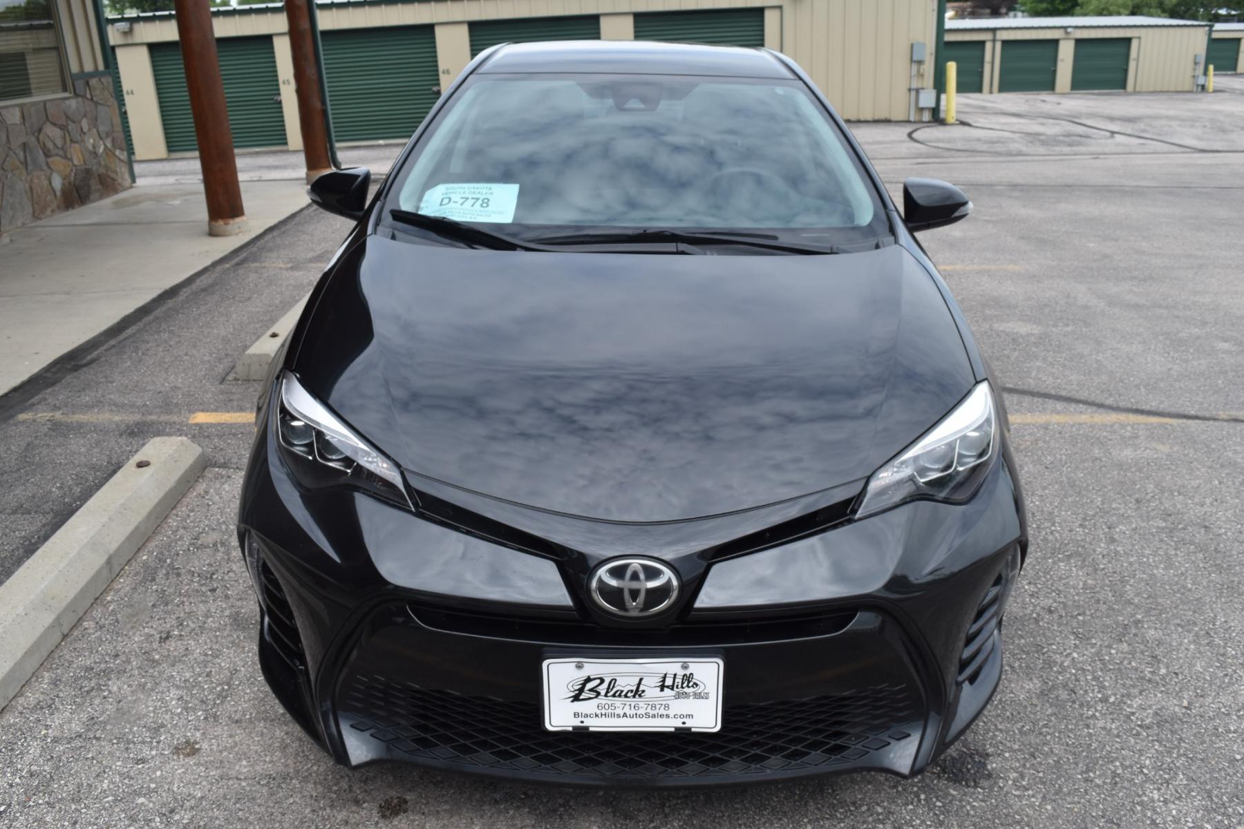 2017 Black Toyota Corolla SE (2T1BURHE5HC) with an 1.8L 4 Cyl engine, AV-S7 Automatic transmission, located at 1600 E Hwy 44, Rapid City, SD, 57703, (605) 716-7878, 44.070232, -103.171410 - Photo #1