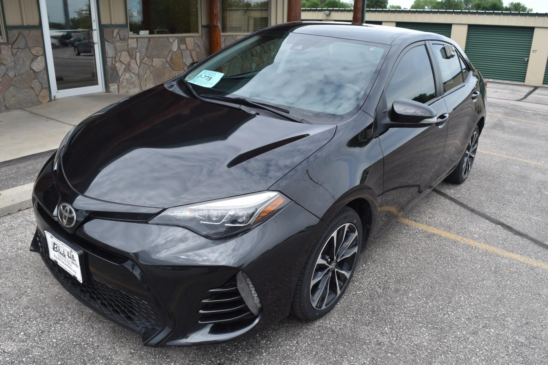 2017 Black Toyota Corolla SE (2T1BURHE5HC) with an 1.8L 4 Cyl engine, AV-S7 Automatic transmission, located at 1600 E Hwy 44, Rapid City, SD, 57703, (605) 716-7878, 44.070232, -103.171410 - Photo #2