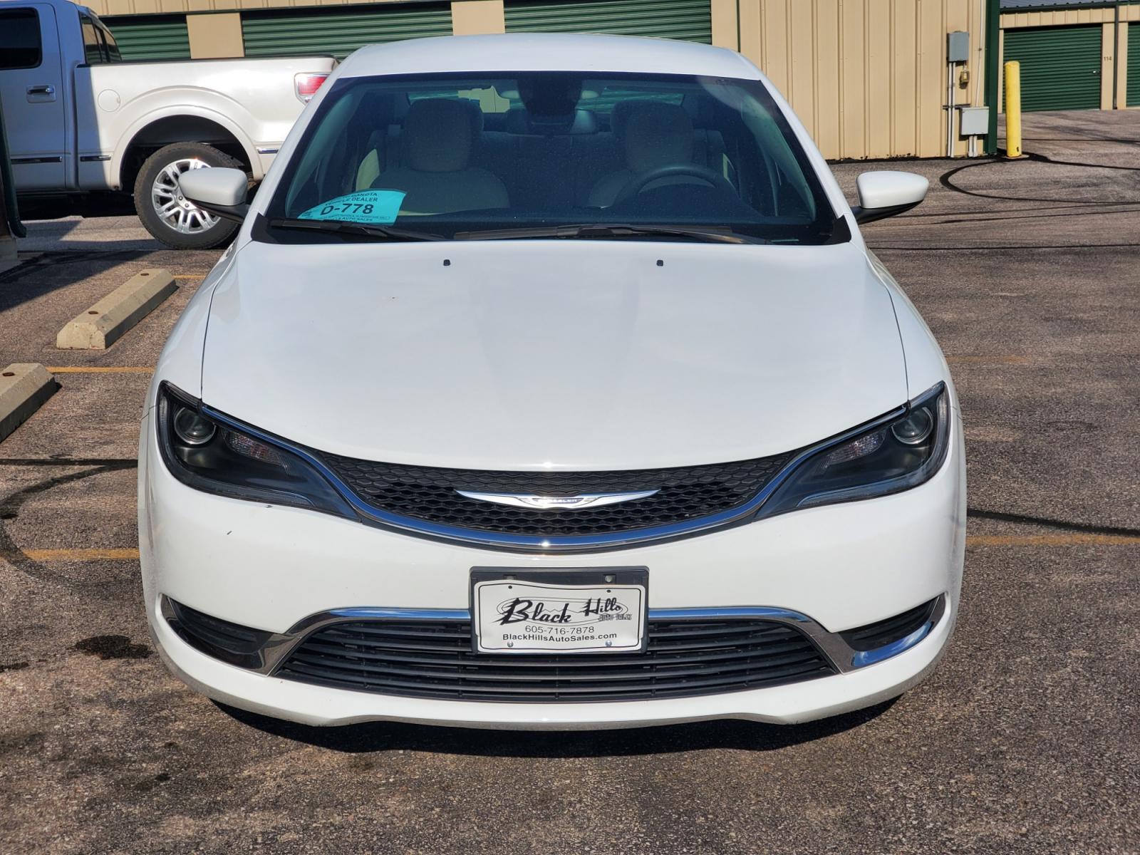 2016 White /Beige Chrysler 200 Limited (1C3CCCAB0GN) with an 2.4L 4 Cyl Multiair engine, 9-Speed Automatic transmission, located at 1600 E Hwy 44, Rapid City, SD, 57703, (605) 716-7878, 44.070232, -103.171410 - Photo #1