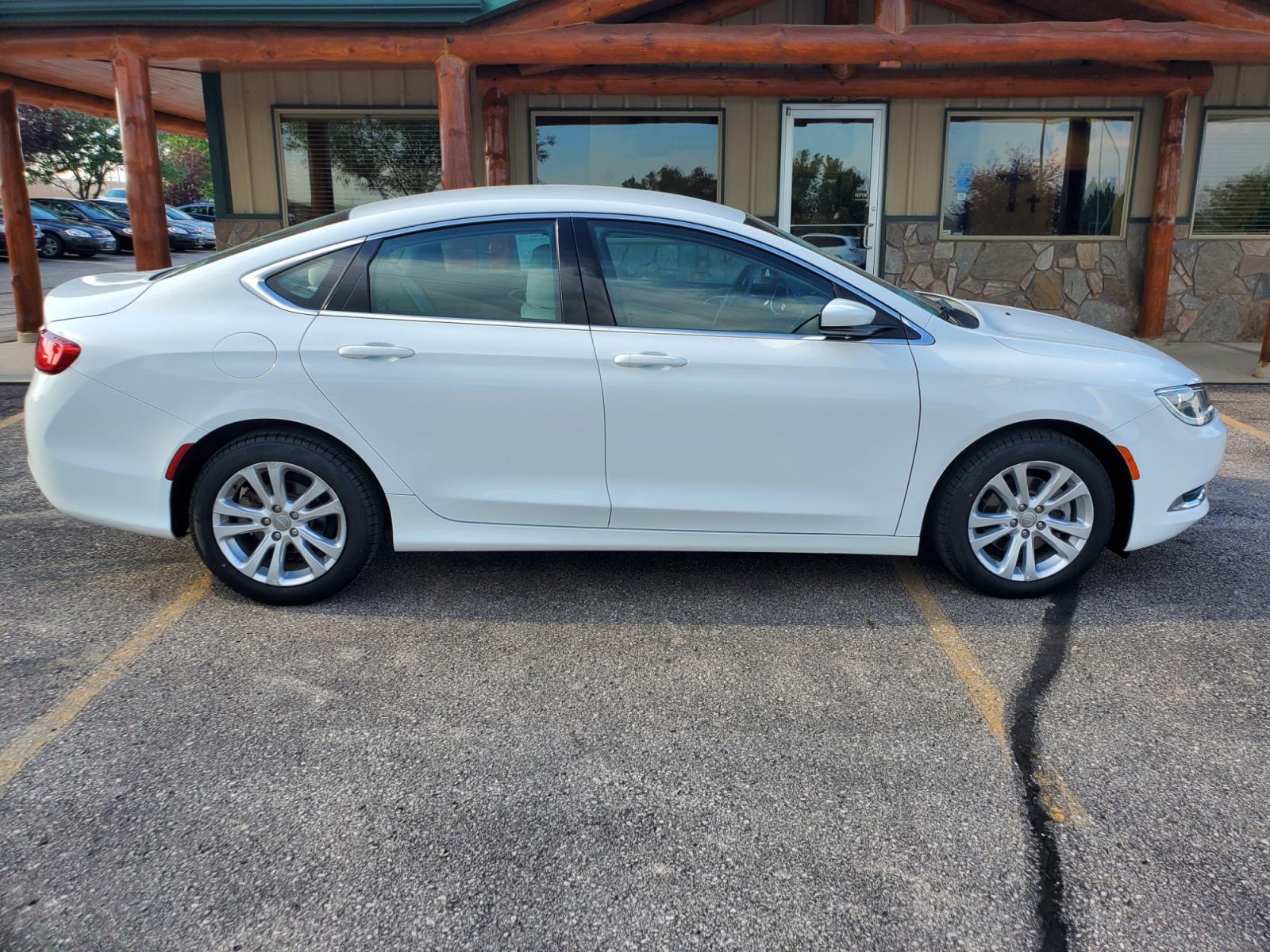 2016 White /Beige Chrysler 200 Limited (1C3CCCAB0GN) with an 2.4L 4 Cyl Multiair engine, 9-Speed Automatic transmission, located at 1600 E Hwy 44, Rapid City, SD, 57703, (605) 716-7878, 44.070232, -103.171410 - Photo #3