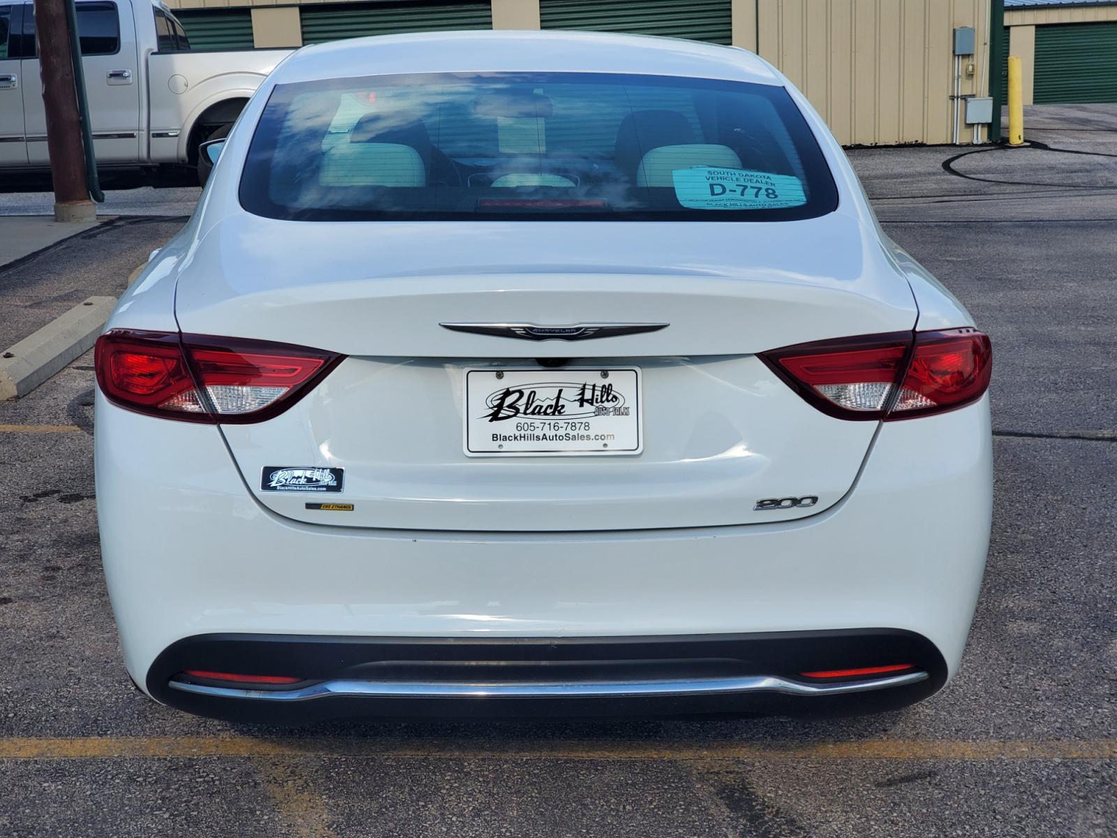 2016 White /Beige Chrysler 200 Limited (1C3CCCAB0GN) with an 2.4L 4 Cyl Multiair engine, 9-Speed Automatic transmission, located at 1600 E Hwy 44, Rapid City, SD, 57703, (605) 716-7878, 44.070232, -103.171410 - Photo #5