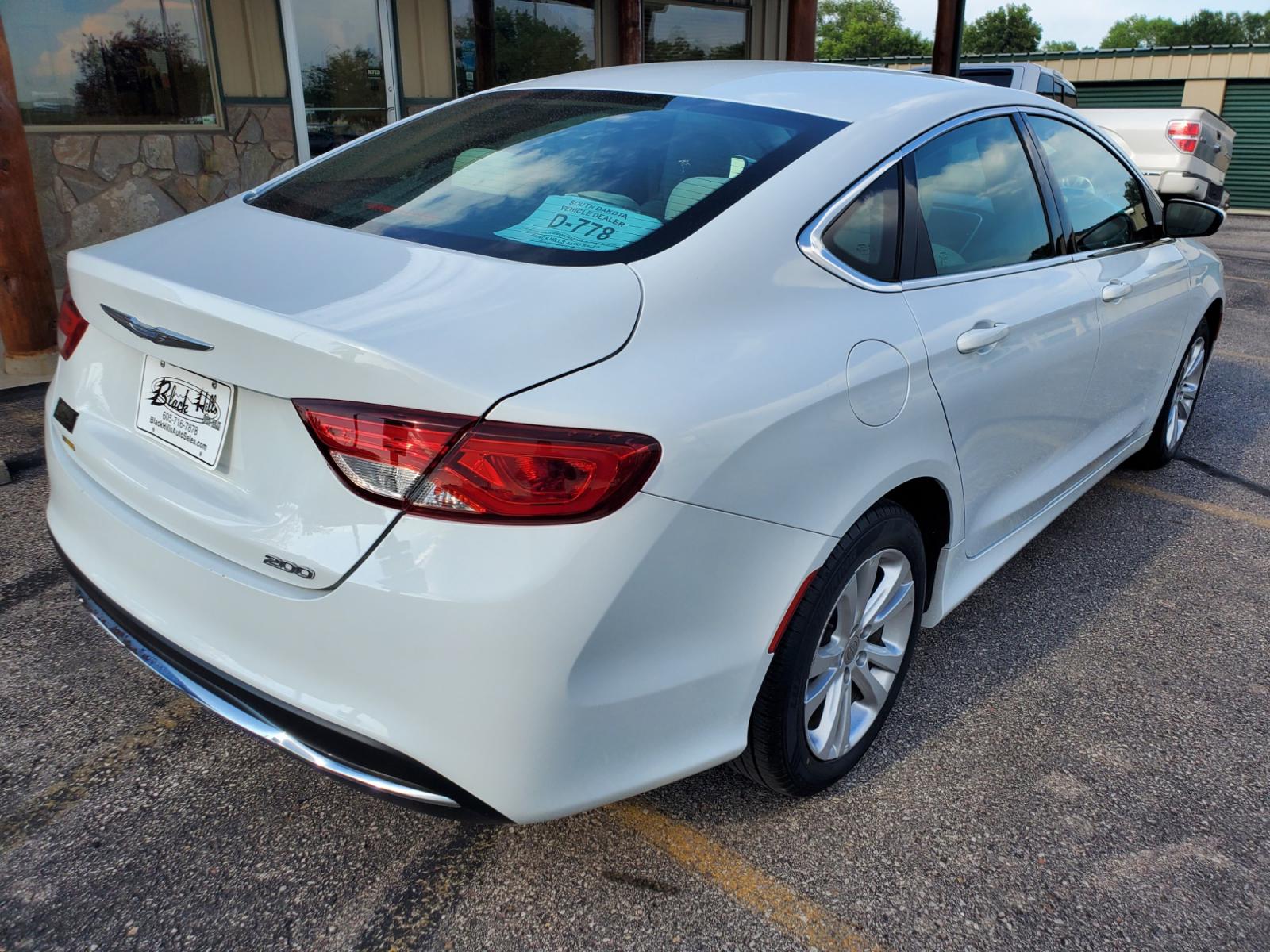 2016 White /Beige Chrysler 200 Limited (1C3CCCAB0GN) with an 2.4L 4 Cyl Multiair engine, 9-Speed Automatic transmission, located at 1600 E Hwy 44, Rapid City, SD, 57703, (605) 716-7878, 44.070232, -103.171410 - Photo #6