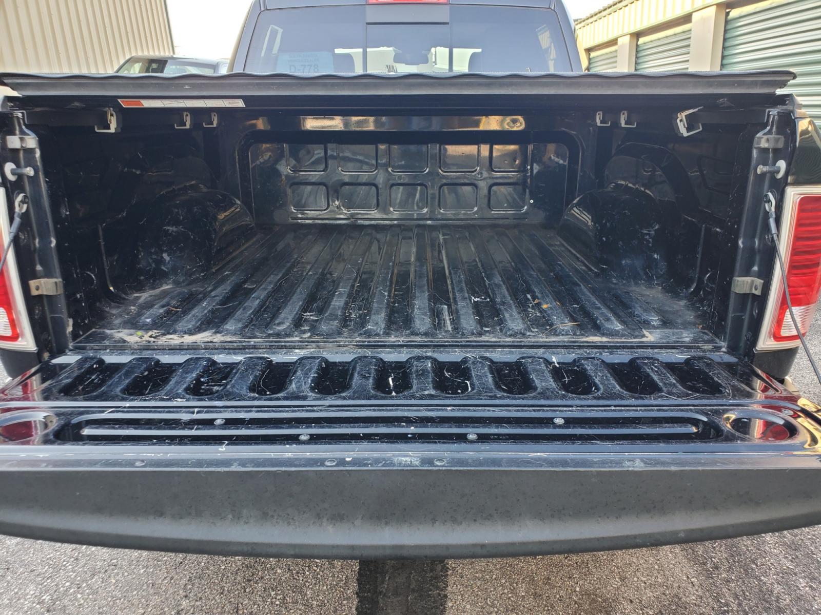 2016 Black /Black Ram 1500 Laramie (1C6RR7NT3GS) with an 5.7L V-8 Hemi engine, 8-Speed Automatic transmission, located at 1600 E Hwy 44, Rapid City, SD, 57703, (605) 716-7878, 44.070232, -103.171410 - Photo #34