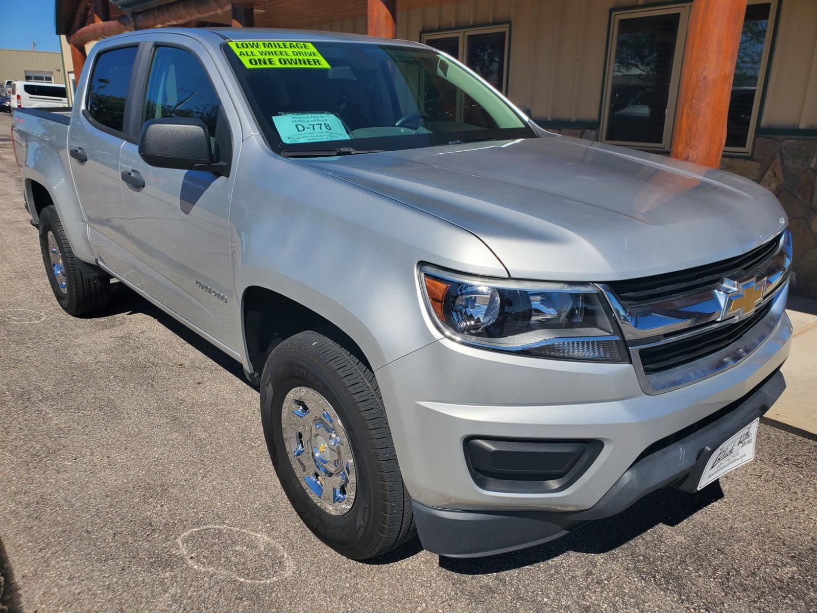 2015 Gray Chevrolet Colorado (1GCGTAE37F1) with an 3.6L V-6 SIDI DOHC VVT engine, 6-Speed Automatic transmission, located at 1600 E Hwy 44, Rapid City, SD, 57703, (605) 716-7878, 44.070232, -103.171410 - Photo #0