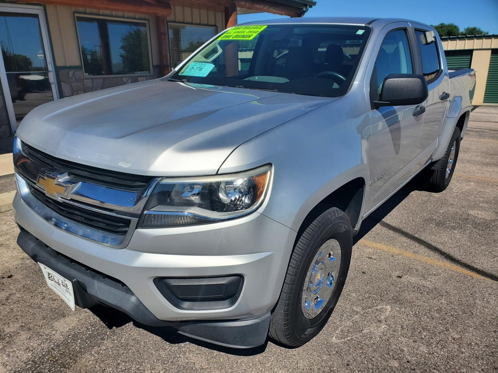 2015 Gray Chevrolet Colorado (1GCGTAE37F1) with an 3.6L V-6 SIDI DOHC VVT engine, 6-Speed Automatic transmission, located at 1600 E Hwy 44, Rapid City, SD, 57703, (605) 716-7878, 44.070232, -103.171410 - Photo #2