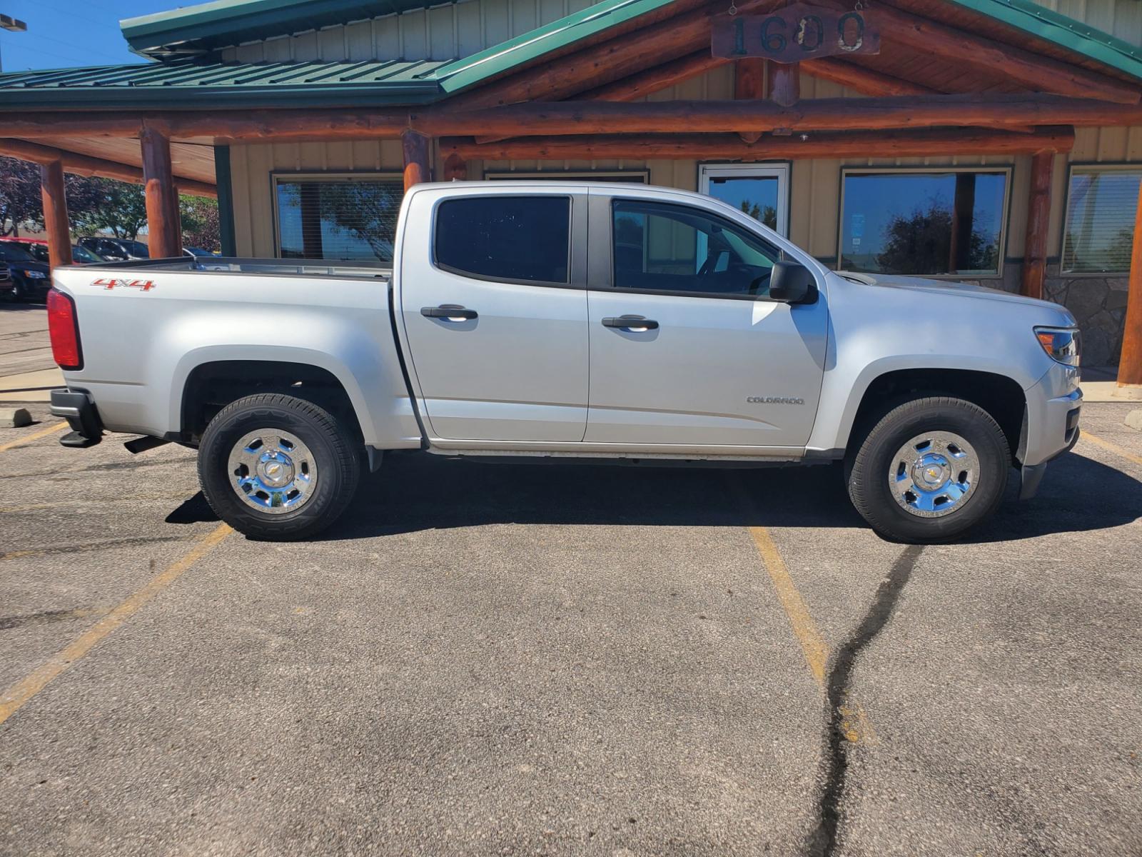 2015 Gray Chevrolet Colorado (1GCGTAE37F1) with an 3.6L V-6 SIDI DOHC VVT engine, 6-Speed Automatic transmission, located at 1600 E Hwy 44, Rapid City, SD, 57703, (605) 716-7878, 44.070232, -103.171410 - Photo #4