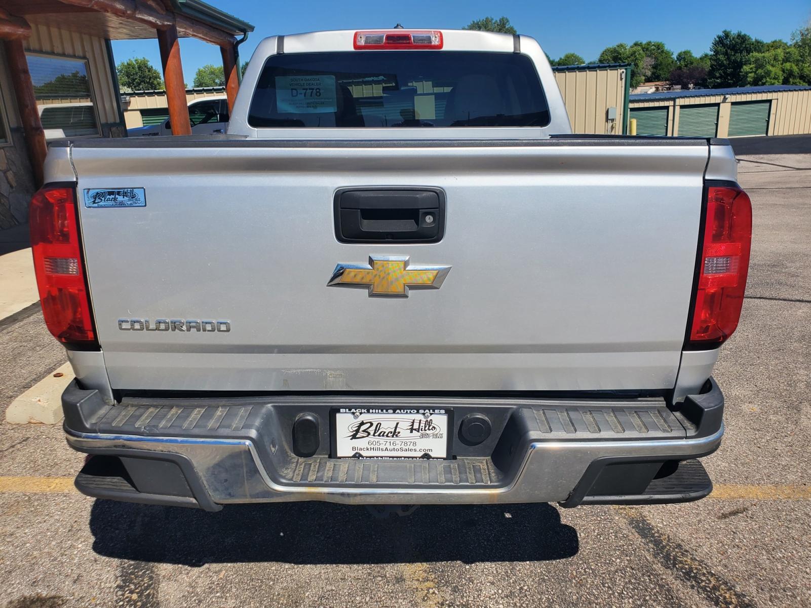 2015 Gray Chevrolet Colorado (1GCGTAE37F1) with an 3.6L V-6 SIDI DOHC VVT engine, 6-Speed Automatic transmission, located at 1600 E Hwy 44, Rapid City, SD, 57703, (605) 716-7878, 44.070232, -103.171410 - Photo #6
