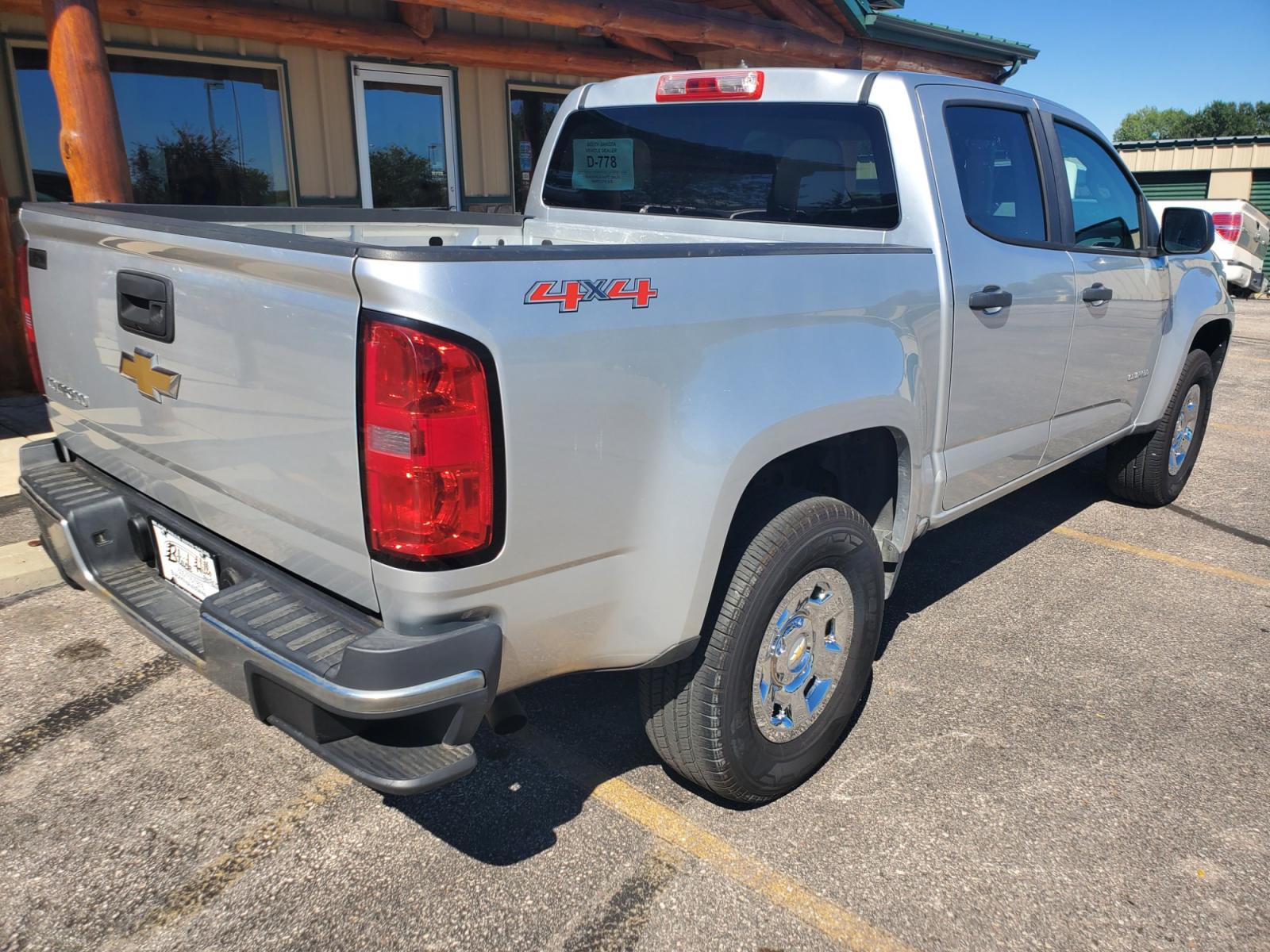 2015 Gray Chevrolet Colorado (1GCGTAE37F1) with an 3.6L V-6 SIDI DOHC VVT engine, 6-Speed Automatic transmission, located at 1600 E Hwy 44, Rapid City, SD, 57703, (605) 716-7878, 44.070232, -103.171410 - Photo #7