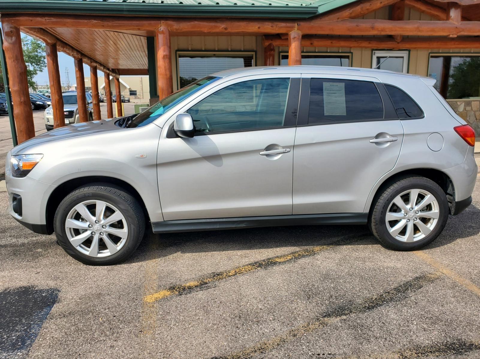 2015 Silver Mitsubishi Outlander Sport ES (4A4AR3AU4FE) with an 2.0l 4 Cyl engine, 6-Speed CVT w/ Overdrive transmission, located at 1600 E Hwy 44, Rapid City, SD, 57703, (605) 716-7878, 44.070232, -103.171410 - Photo #3
