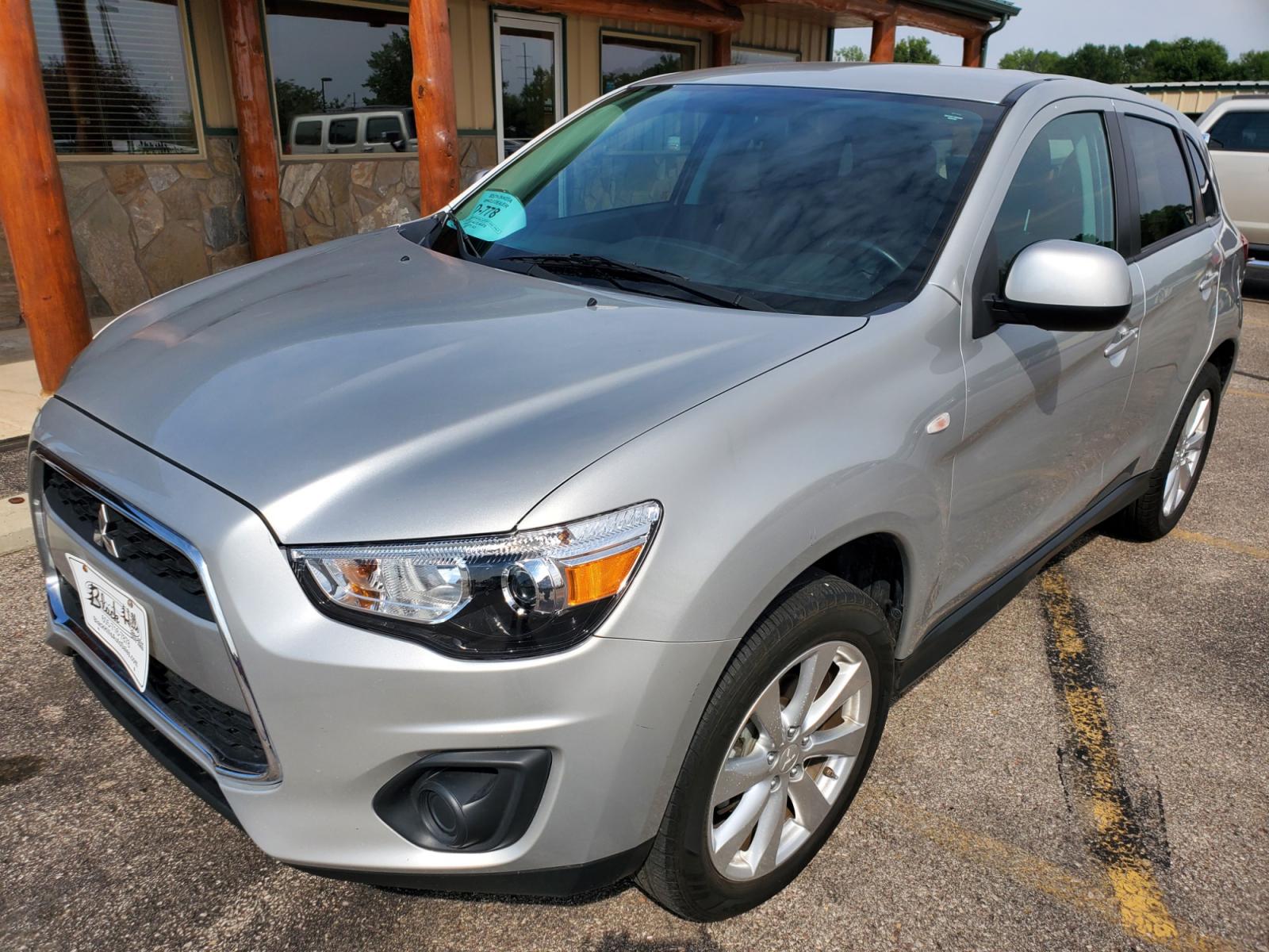 2015 Silver Mitsubishi Outlander Sport ES (4A4AR3AU7FE) with an 2.0l 4 Cyl engine, 6-Speed CVT w/ Overdrive transmission, located at 1600 E Hwy 44, Rapid City, SD, 57703, (605) 716-7878, 44.070232, -103.171410 - Photo #2
