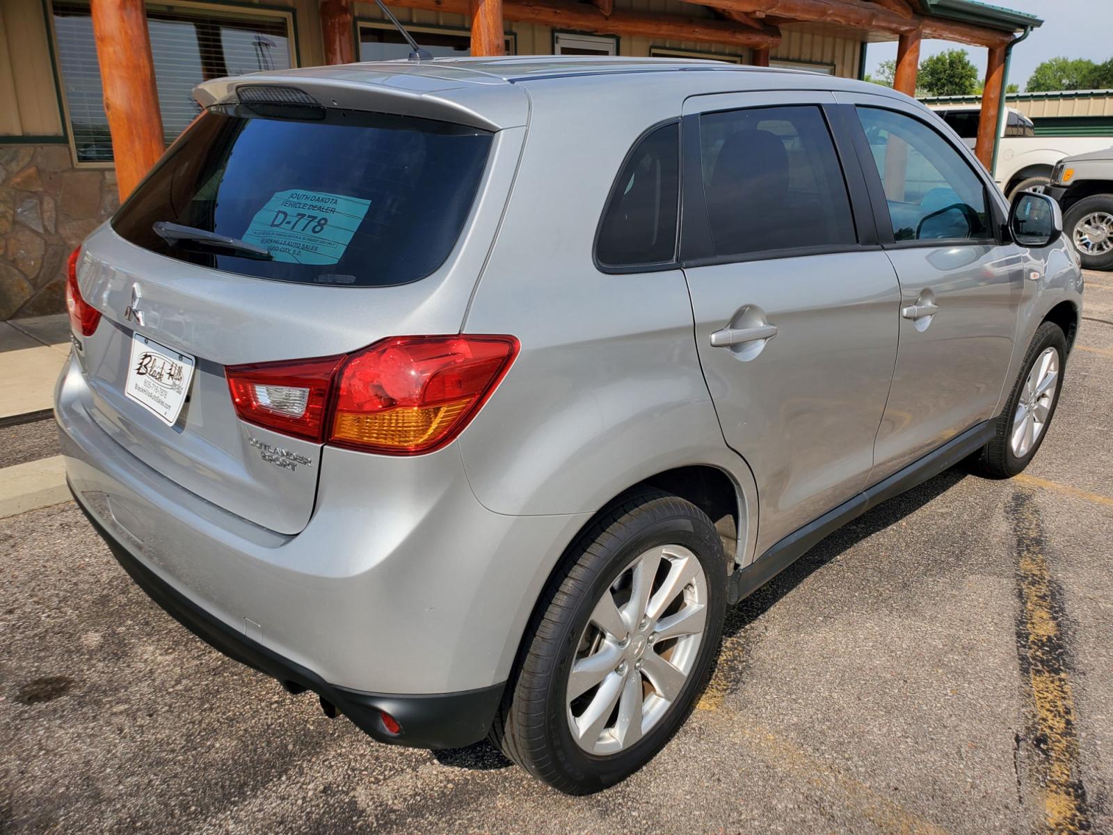 2015 Silver Mitsubishi Outlander Sport ES (4A4AR3AU7FE) with an 2.0l 4 Cyl engine, 6-Speed CVT w/ Overdrive transmission, located at 1600 E Hwy 44, Rapid City, SD, 57703, (605) 716-7878, 44.070232, -103.171410 - Photo #7