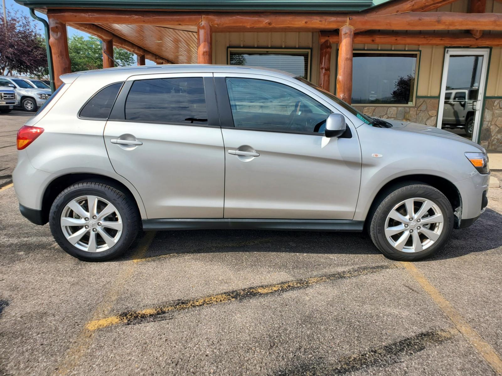 2015 Silver Mitsubishi Outlander Sport ES (4A4AR3AU7FE) with an 2.0l 4 Cyl engine, 6-Speed CVT w/ Overdrive transmission, located at 1600 E Hwy 44, Rapid City, SD, 57703, (605) 716-7878, 44.070232, -103.171410 - Photo #4