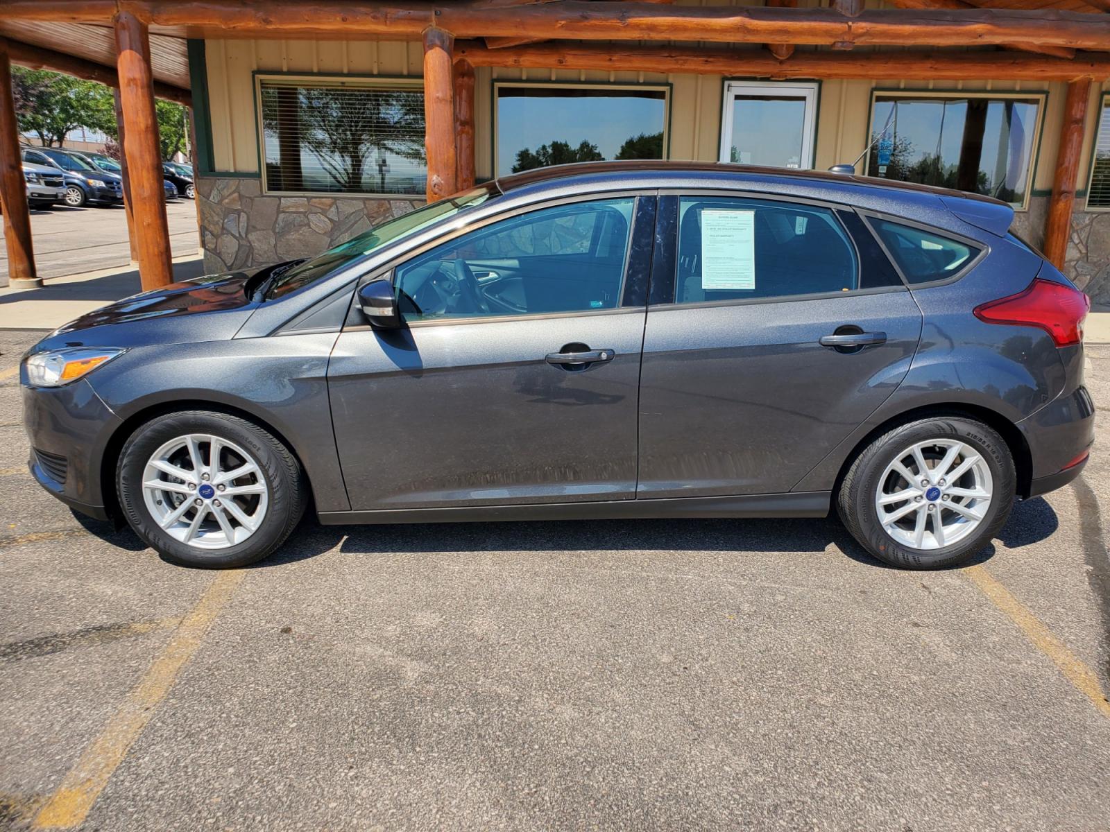 2017 Gray /Gray Ford Focus SE (1FADP3K29HL) with an 2.0L 4Cyl GDI TI-VCT engine, 6-Speed Powershift Automatic transmission, located at 1600 E Hwy 44, Rapid City, SD, 57703, (605) 716-7878, 44.070232, -103.171410 - Photo #3