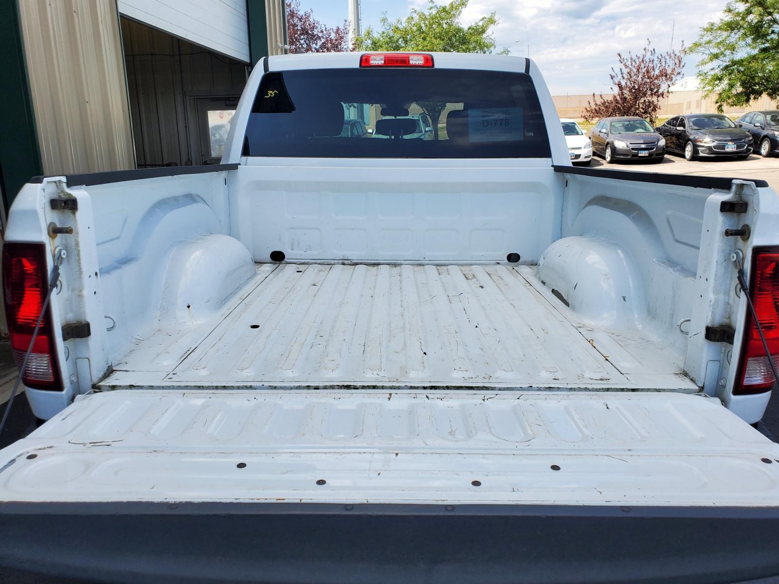 2014 White /Gray Ram 1500 Tradesman (1C6RR7KG2ES) with an 3.6L V-6 24V VVT engine, 8-Speed Automtic transmission, located at 1600 E Hwy 44, Rapid City, SD, 57703, (605) 716-7878, 44.070232, -103.171410 - Photo #23